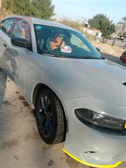دۆج چارجەر